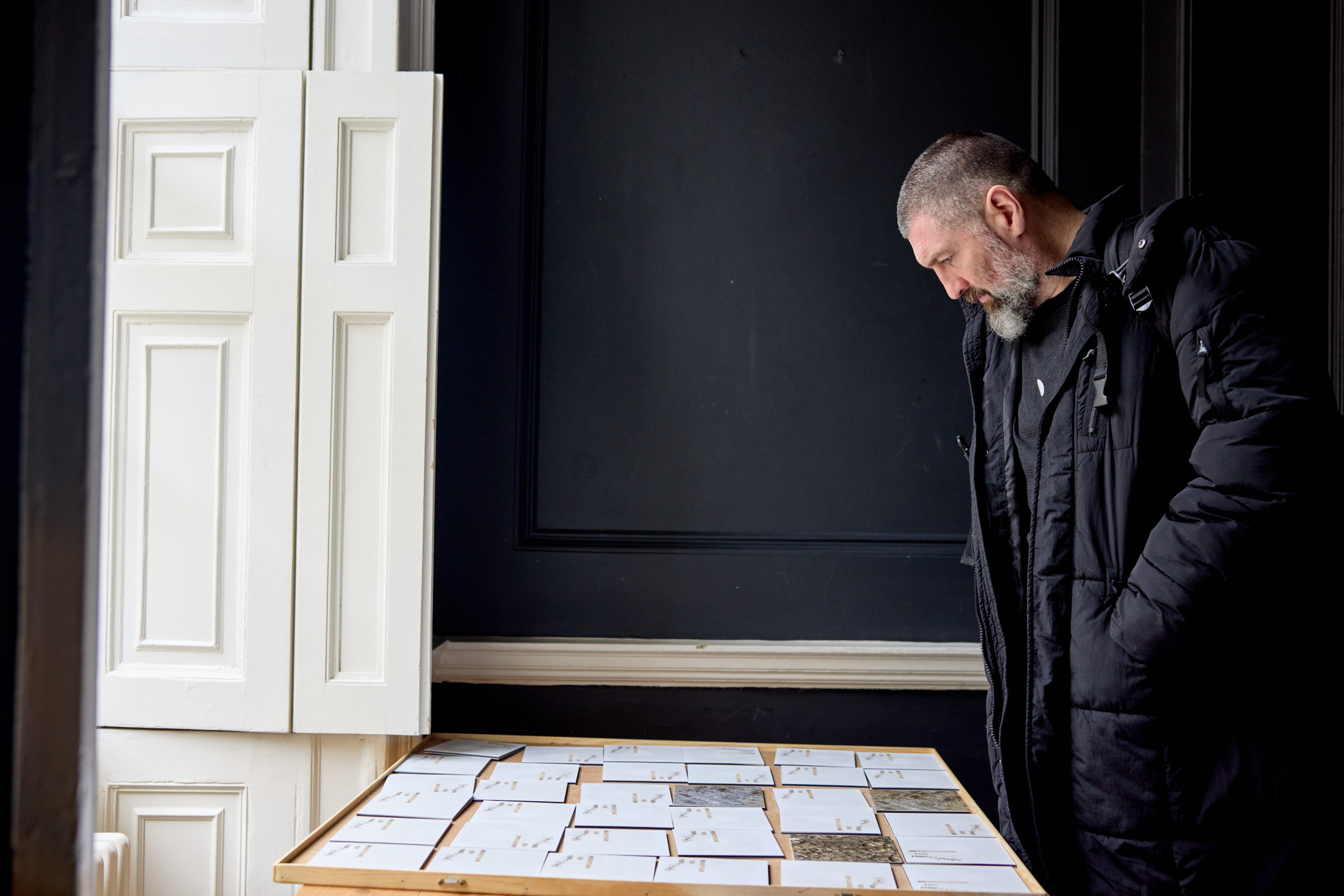 Memorygame for Forgetfulness — aerial photographs of destruction laid out as a matching game